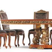 Элегантный стол и стулья для столовой комнаты.