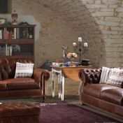 Кожаный коричневый диван