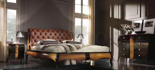 Кровать в кожаной обивке