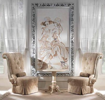 Мягкие стулья и круглый столик.