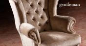 Мягкое кресло классической формы.