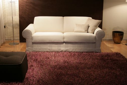 Раскладной диван бежевого цвета