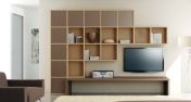 Стенка для гостиной с множеством полок и местом под телевизор